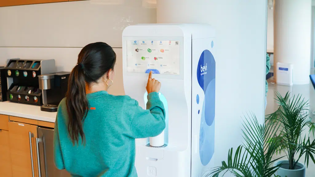 customer using a bevi water machine in a chicago office